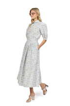 Camicia vichy e floreale con maniche a sbuffo