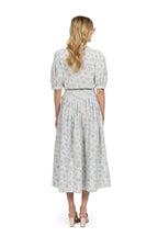 Camicia vichy e floreale con maniche a sbuffo