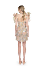 Mini abito con paillettes stampate e fiocchi