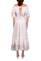 Vestito bianco in cotone ricamato
