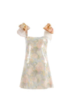 Mini abito con paillettes stampate e fiocchi