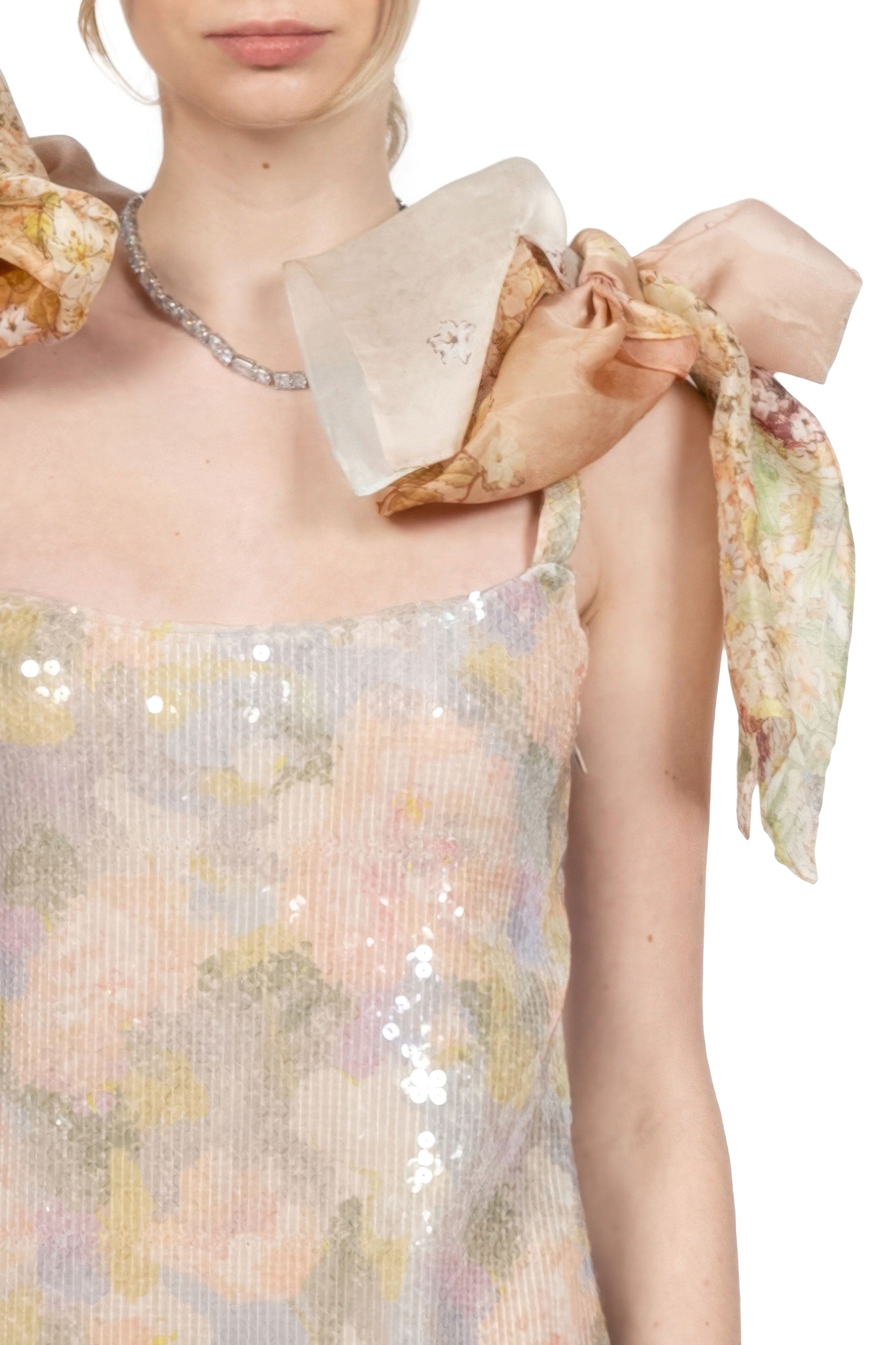 Mini abito con paillettes stampate e fiocchi
