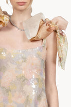 Mini abito con paillettes stampate e fiocchi