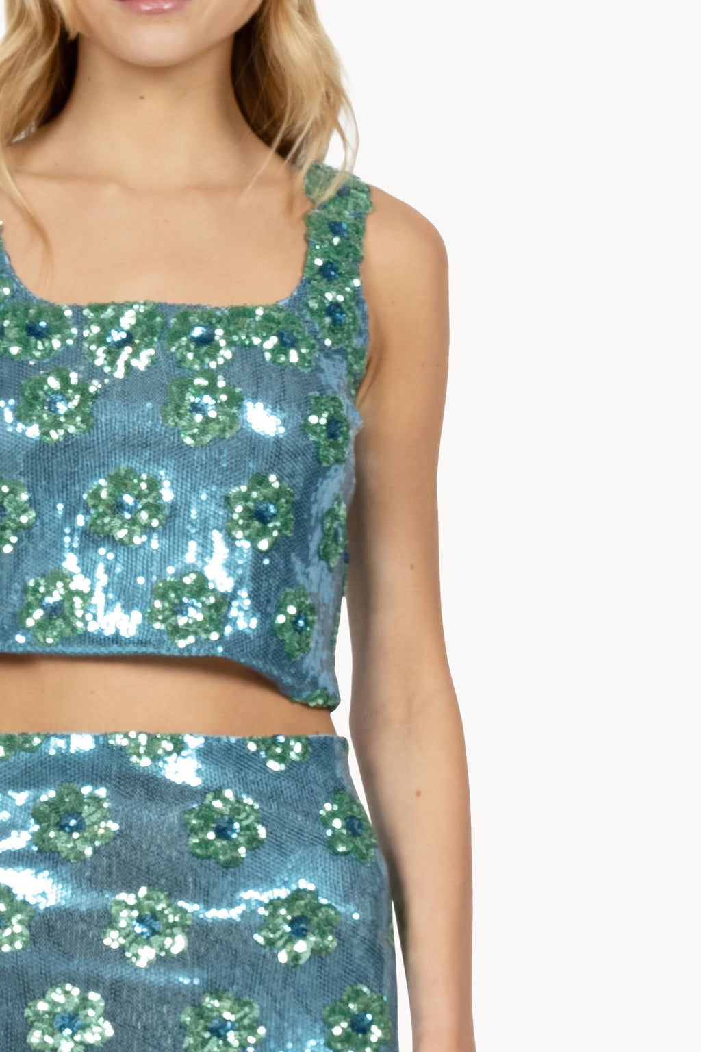 Top con paillettes a margherina blu