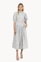 Camicia vichy e floreale con maniche a sbuffo