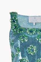Top con paillettes a margherina blu