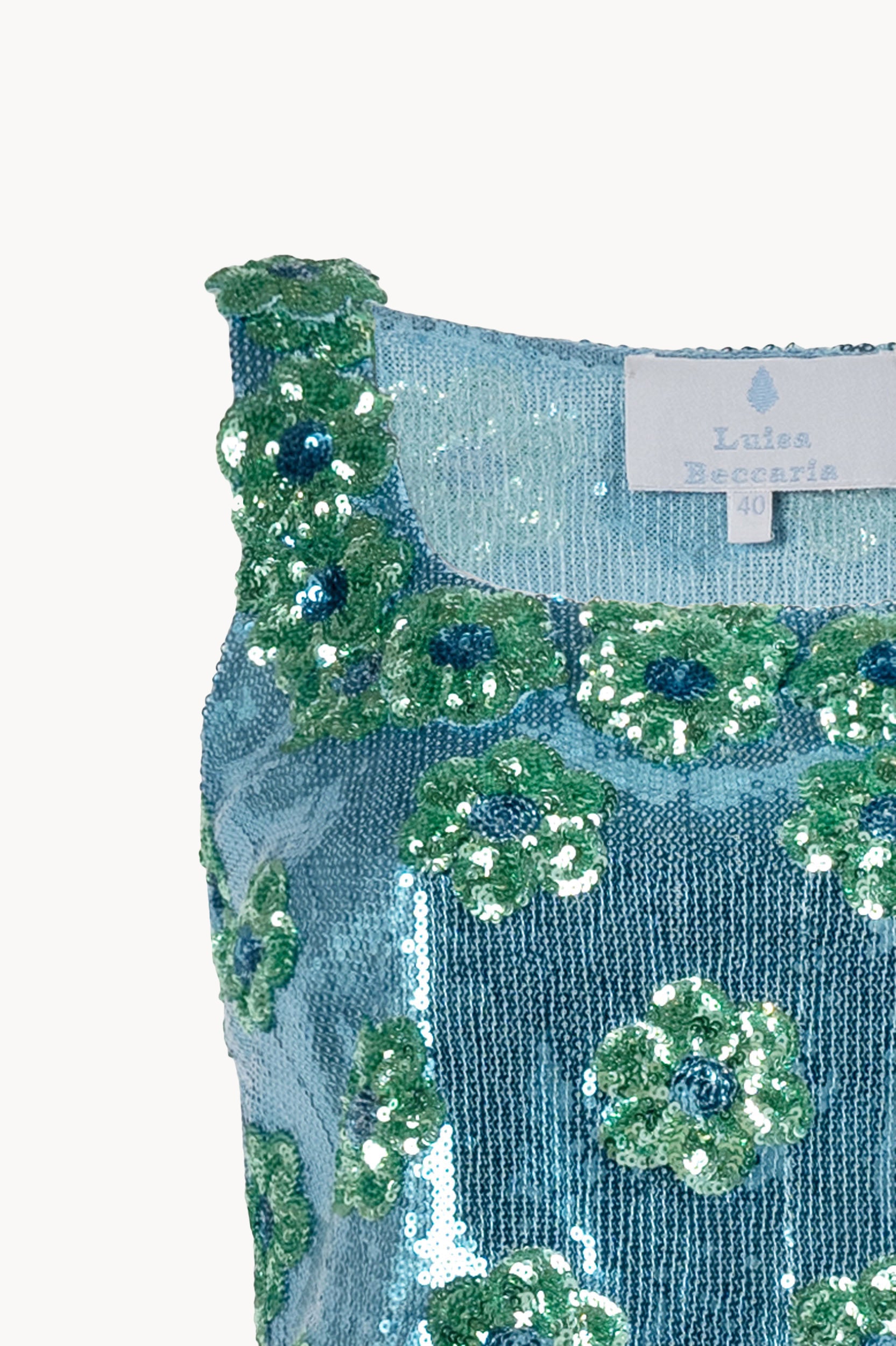 Top con paillettes a margherina blu