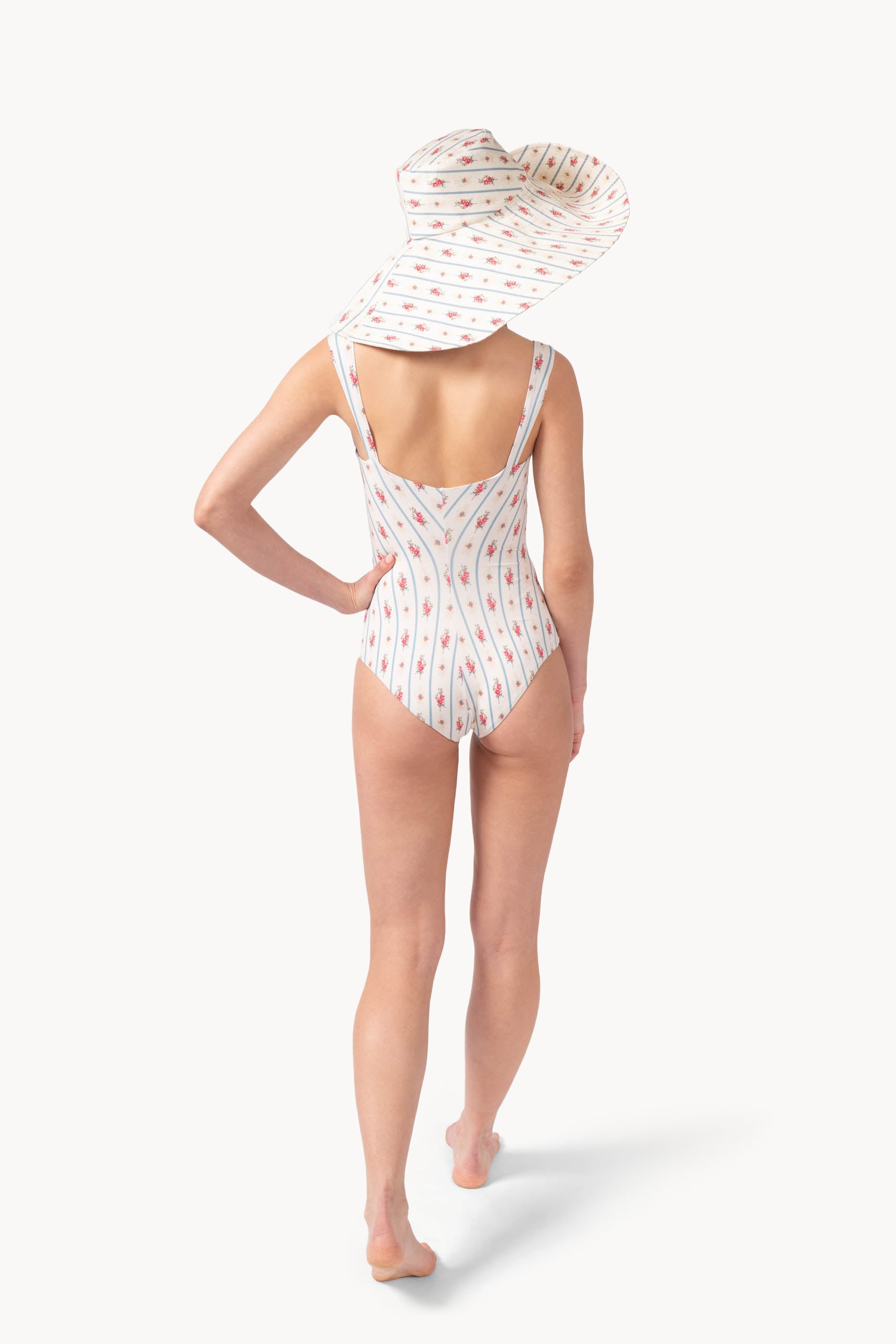 Costume intero con fantasia floreale e a righe