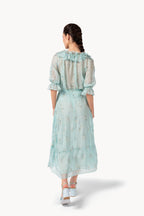 Blusa in chiffon ricamata con colletto a volant