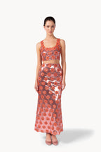 Top rosa con margherita e paillettes