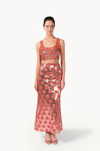 Top rosa con margherita e paillettes