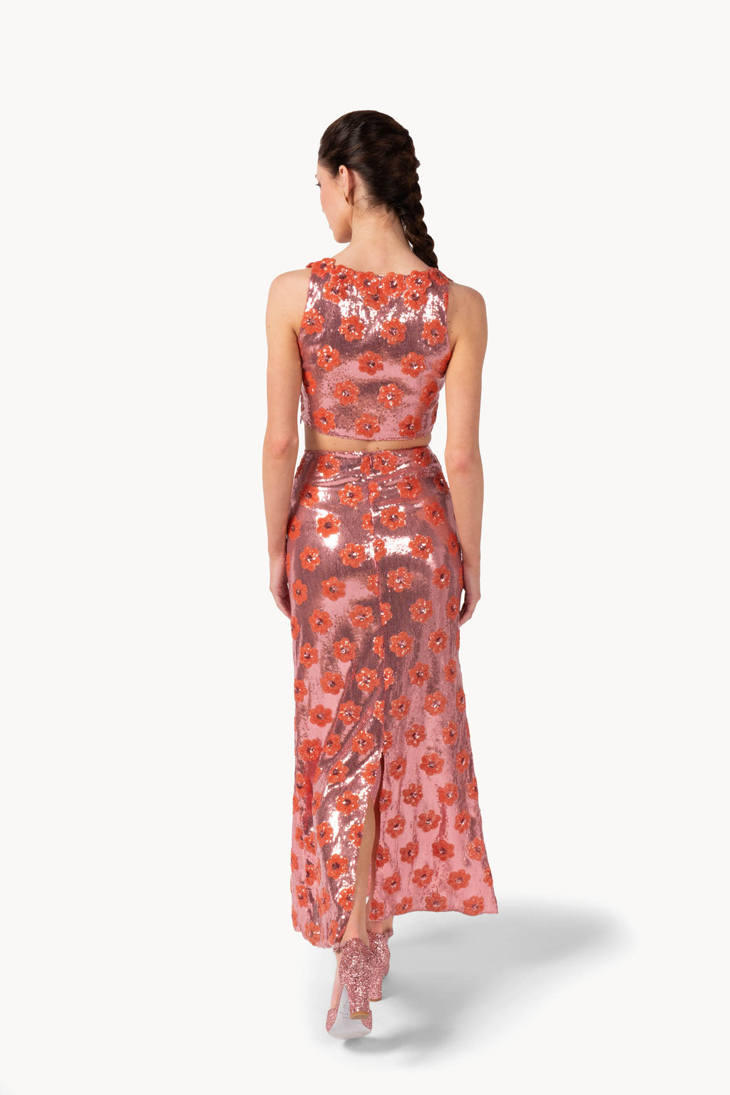 Top rosa con margherita e paillettes