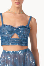 Top in tulle con paillettes