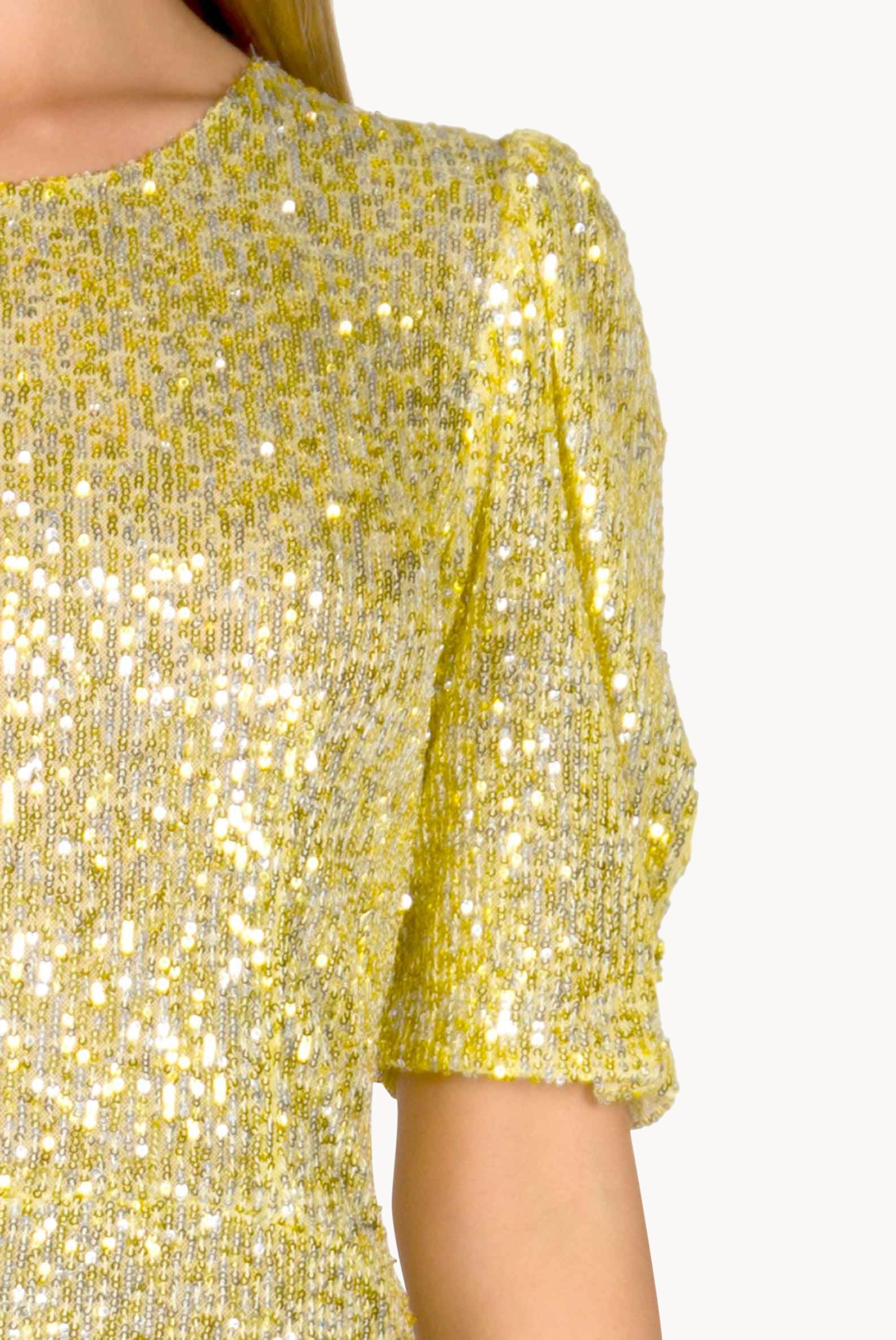 Vestito con paillettes e balze