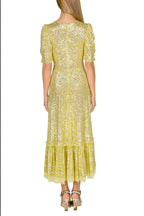 Vestito con paillettes e balze