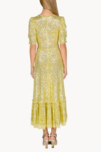 Vestito con paillettes e balze