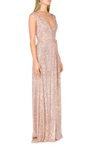 Vestito rosa con paillettes a portafoglio