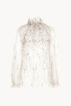 Blusa a collo alto in tulle ricamato