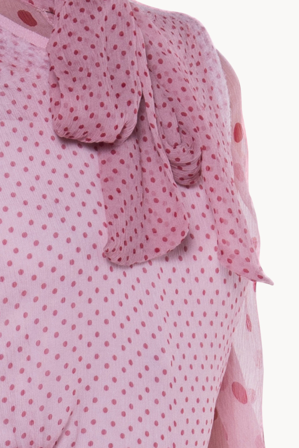 Blusa in chiffon di seta a pois con fiocco alla gola