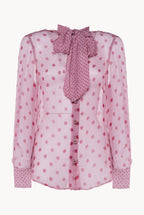 Blusa in chiffon di seta a pois con fiocco alla gola