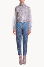 Blusa a collo alto in tulle ricamato