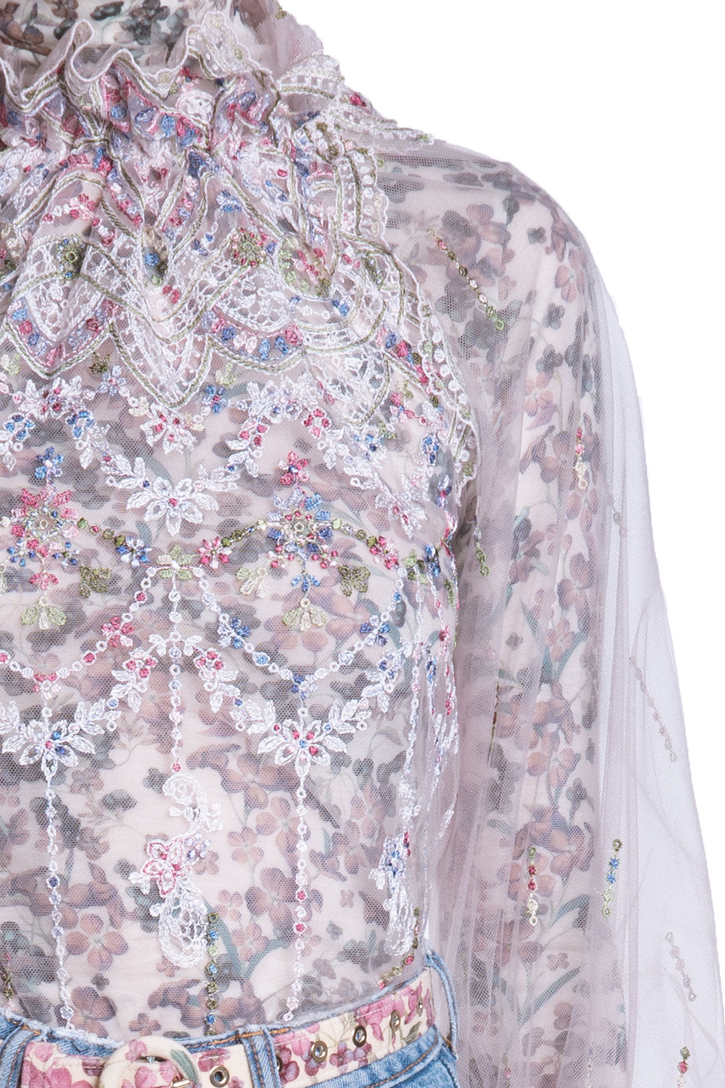 Blusa a collo alto in tulle ricamato