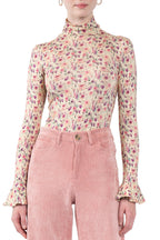 Dolcevita in jersey crema stampato con rose selvatiche