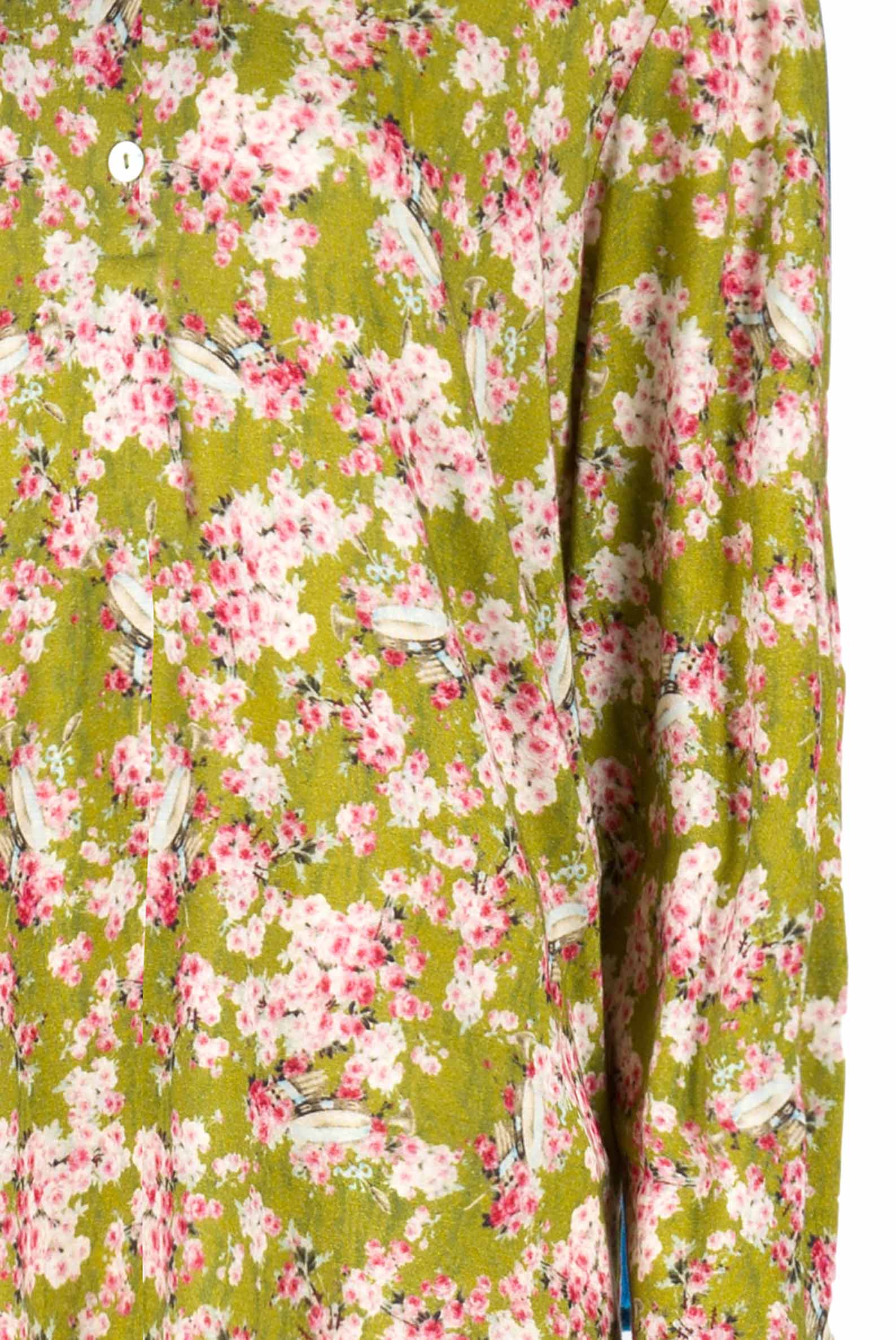 Polo in jersey verde con boccioli di rosa stampati