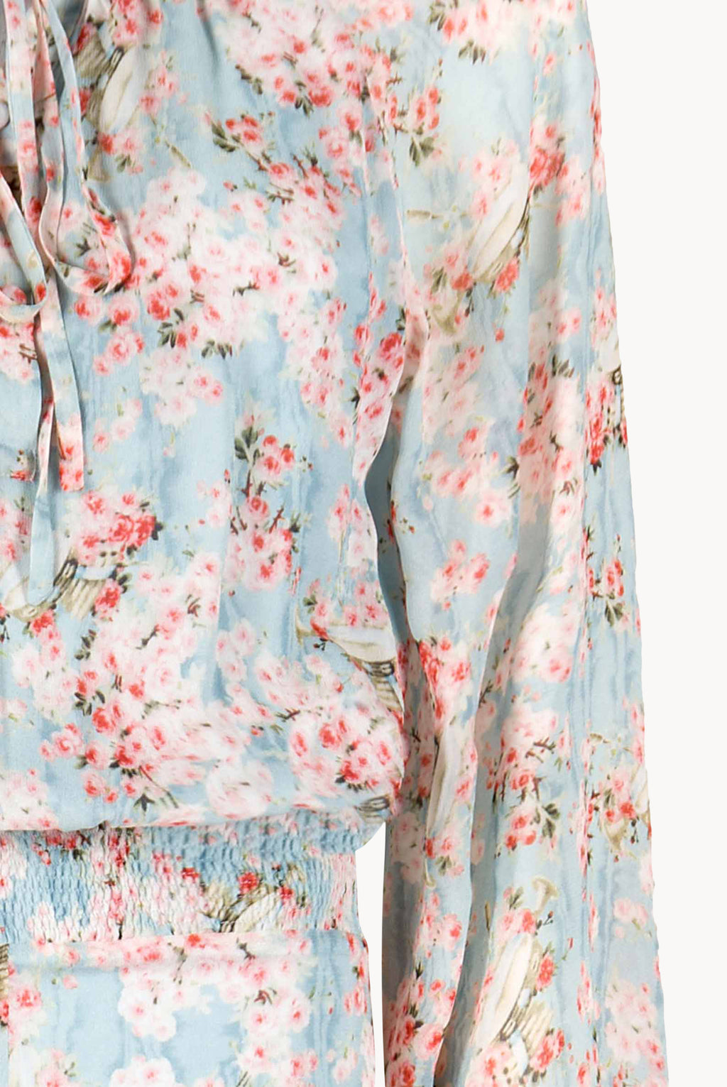 Tuta in georgette stampata con boccioli di rosa