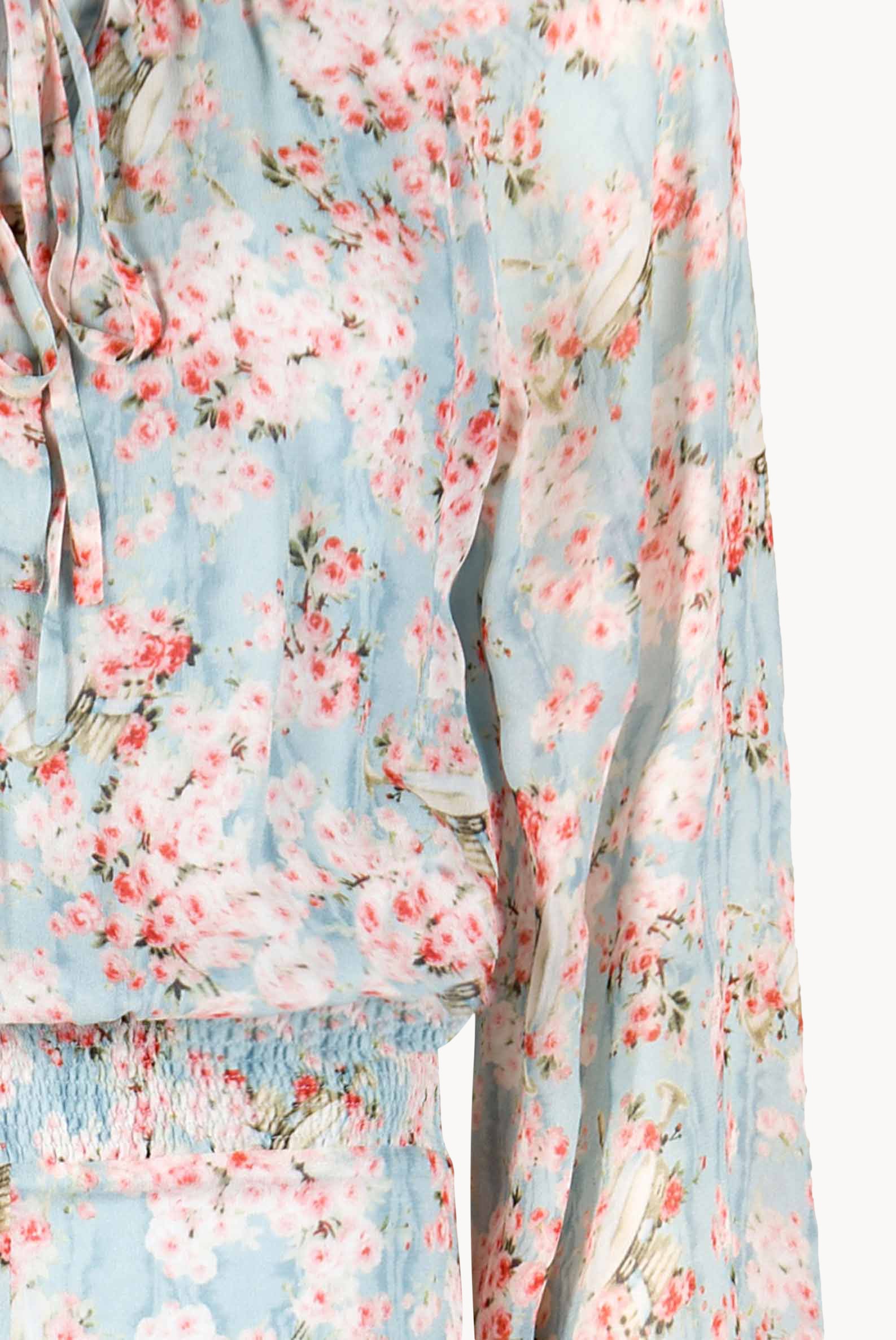 Tuta in georgette stampata con boccioli di rosa