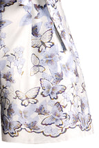 Shorts in popeline stampati con farfalle