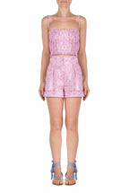 Top drappeggiato in lino con stampa rose
