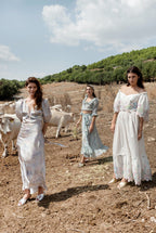 Vestito bianco in cotone ricamato