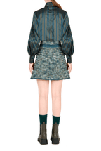 Minigonna in tweed con pizzo